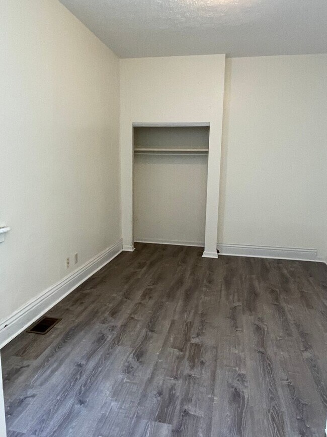 Building Photo - Updated three bedroom two bathroom home in...