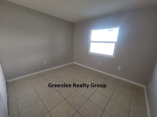 Building Photo - Relax by the water in this spacious 2-bedroom home with a 2-car garage, nestled in the highly des...