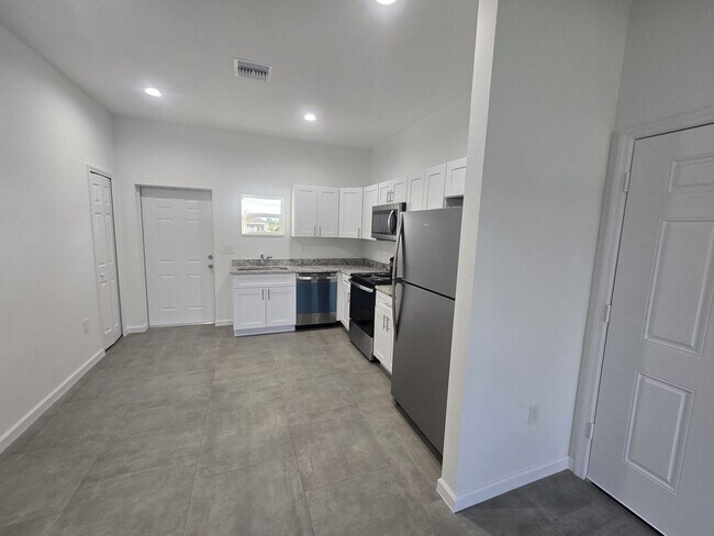 Building Photo - Brand-New 2/2/1 -SW Lehigh Acres-See this ...