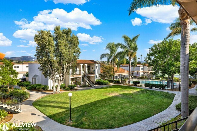 Building Photo - Modern 1-Bed Upstairs Condo with Garage & ...