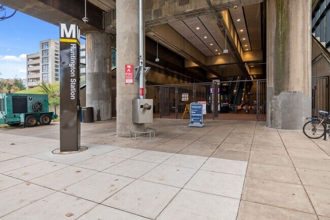 Building Photo - Plug and Play Luxury Condo Next to the Metro: Parking & Utilities Included