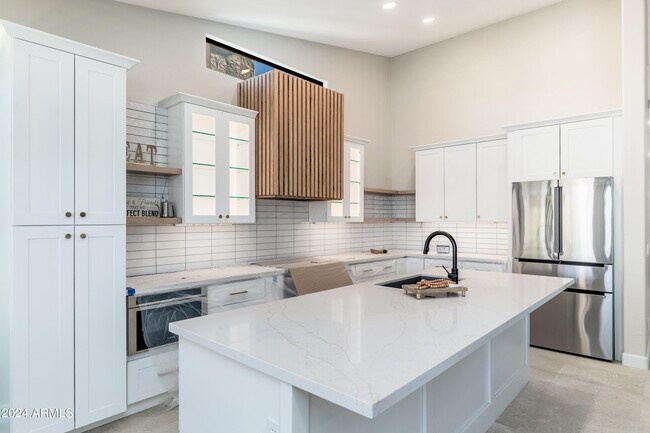 Building Photo - 6768 E Evans Dr