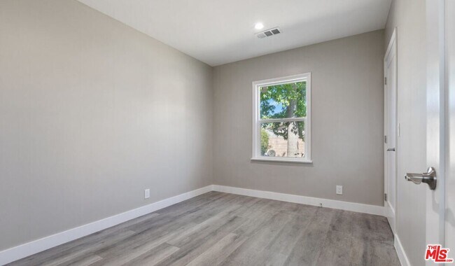 Building Photo - 9217 Langdon Ave