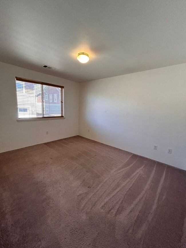 Building Photo - 3 Bedroom 2 Bath Home with a 2 Car Attached Garage