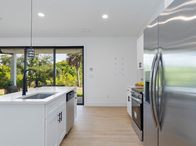Building Photo - Brand New 3 Bedroom Canal Front Home for Rent in North Port