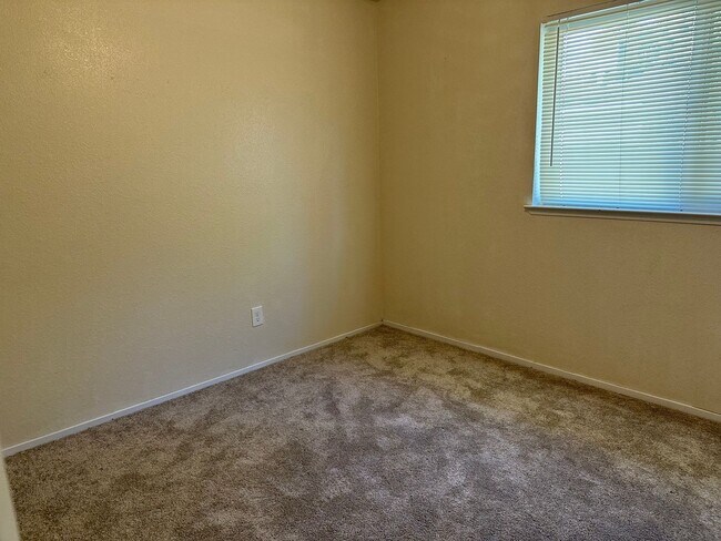 Building Photo - Charming Redding Home with Fireplace & Vau...