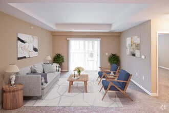 Bright Living Area in Montclair Village Apartments - Montclair Village