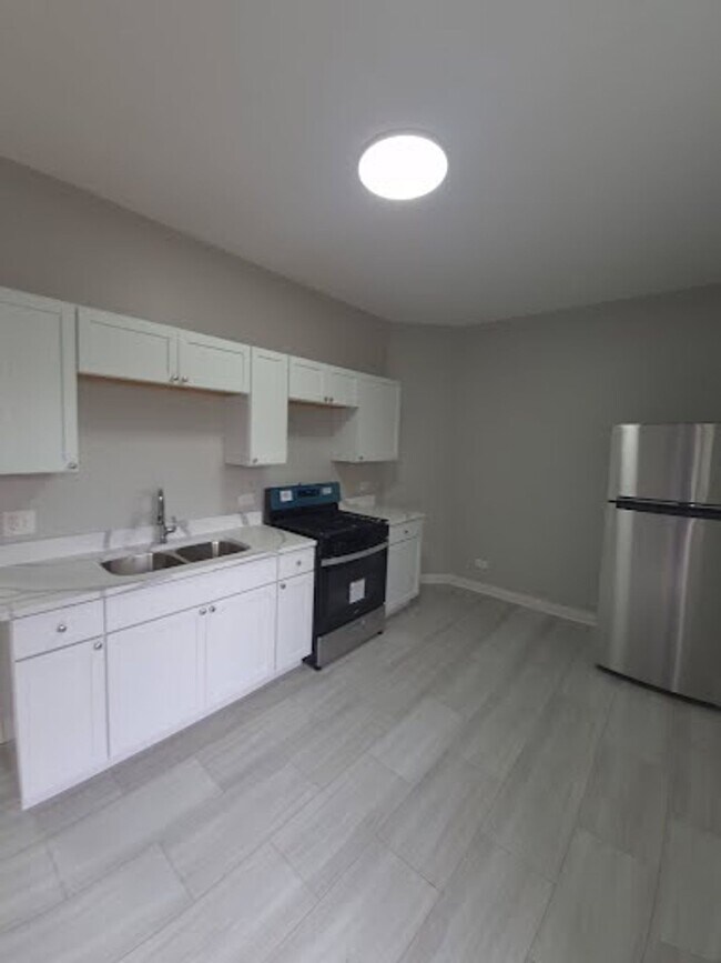 Building Photo - 4157-4159 W Adams St