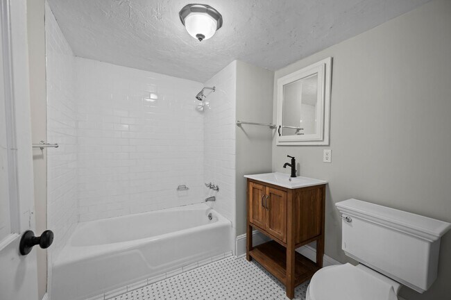 Building Photo - Beautiful 4 Bedroom 3.5 Bathroom Home On Quiet Tree-Lined Street In Millwood.