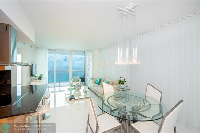 Building Photo - 6899 Collins Ave