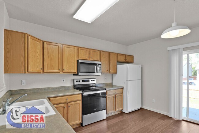 Building Photo - Cute home with engineered hardwood flooring throughout is available now!