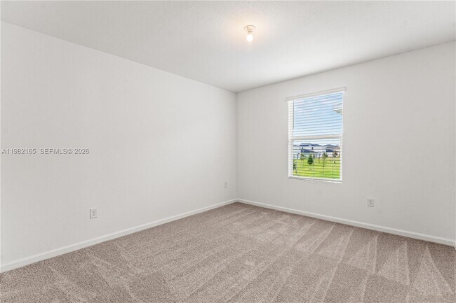 Building Photo - 10722 NW Moon Rise Ln