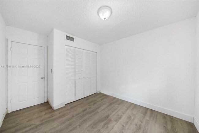 Building Photo - 4335 NW S Tamiami Canal Dr