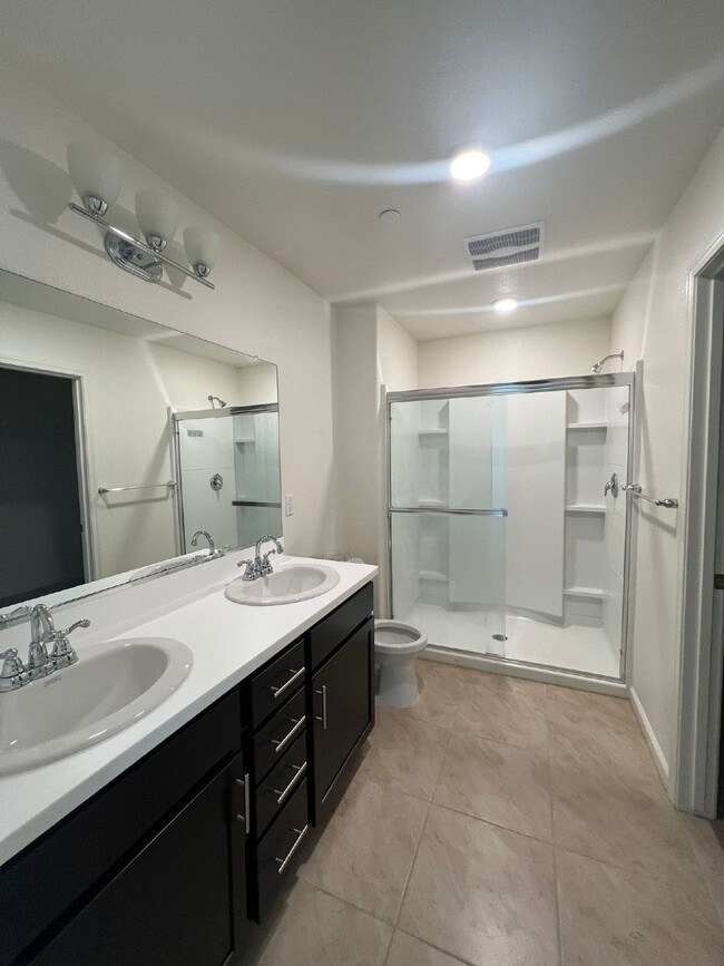 Building Photo - Welcome to modern living in a secure, gated community!