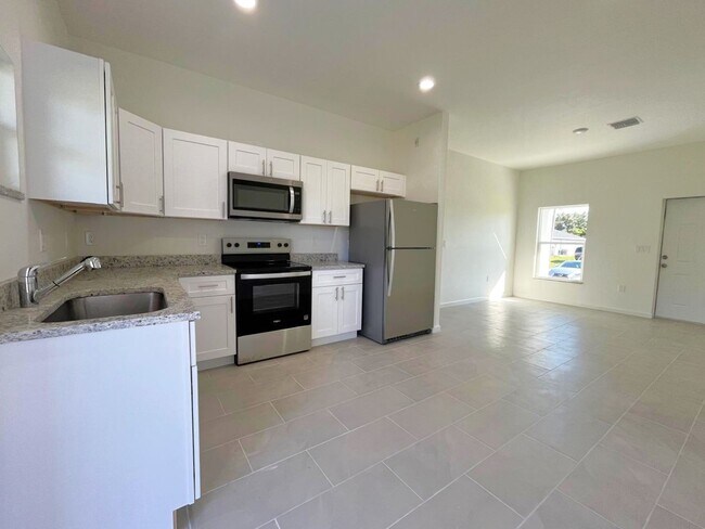 Building Photo - BRAND NEW 2/2/1- SW LEHIGH ACRES