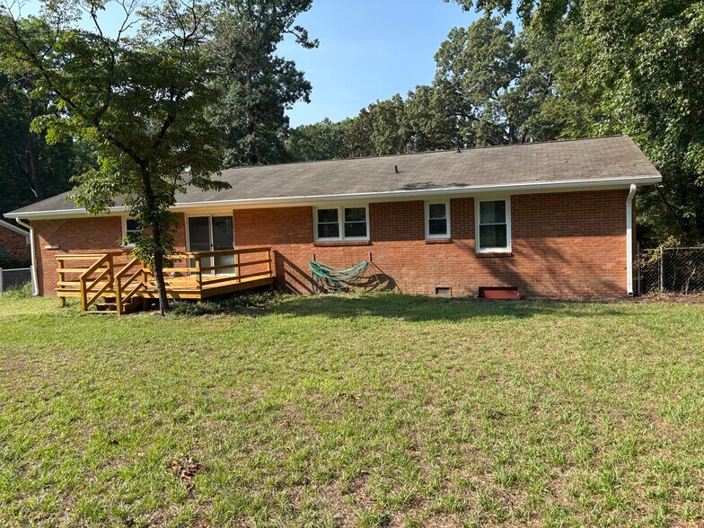 Back of house with new deck - 3608 Red Bud St