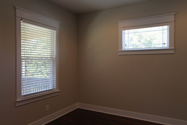 Building Photo - The Doll House -- Cool Two Bedroom at The Cottages on Vinton!