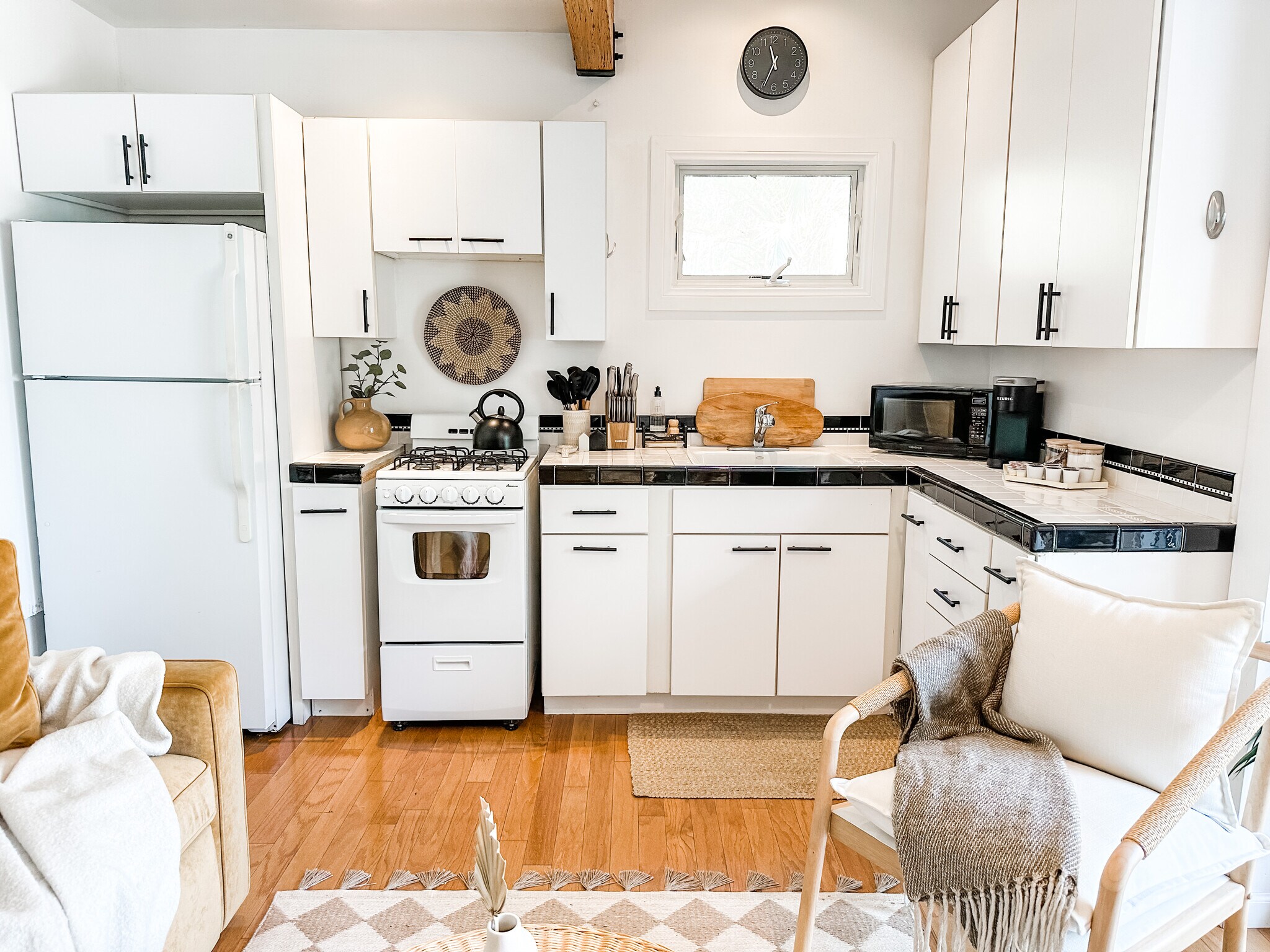 Kitchen with Refrigerator, Stove, and Microwave - 5025 College View Ave