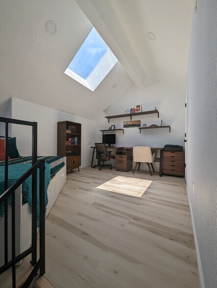 Non-conforming bedroom, with a skylight and plenty of sunshine. Favorite spot in the condo! - 842 S Vance St