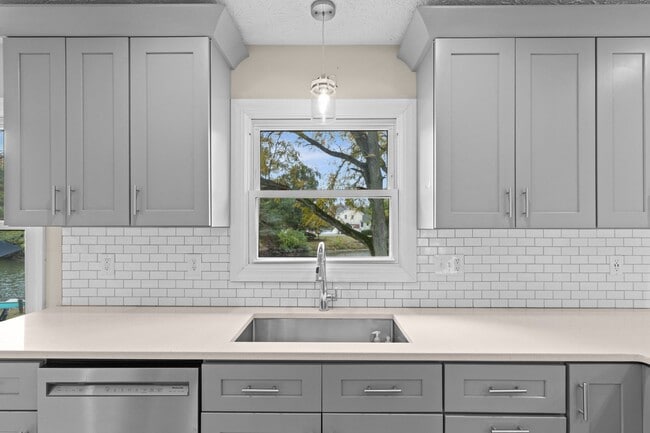 Building Photo - AVAILABLE NOW! Waterfront Living in Carmel! Paddle boat included!