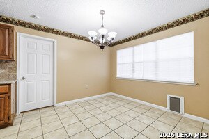 Building Photo - 8411 Aristotle