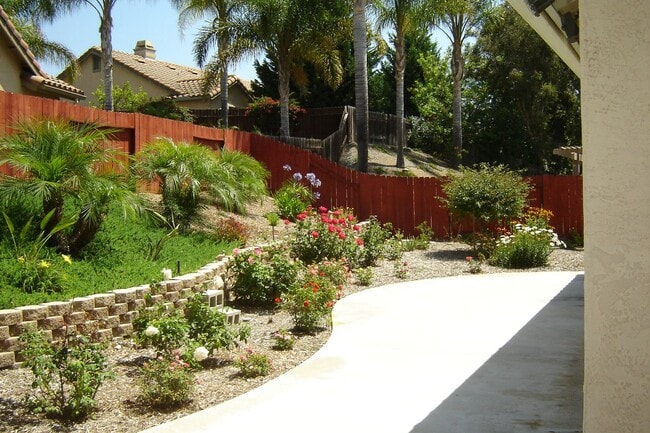 Building Photo - Spacious single-level home located on a quiet corner lot in a well-established Oceanside neighbor...