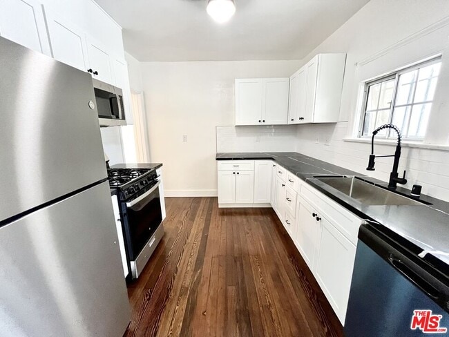 Building Photo - 1268 S Highland Ave