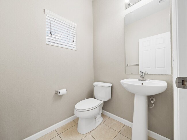 Building Photo - Corner Unit ~ Lake View ~ Maintenance Free...