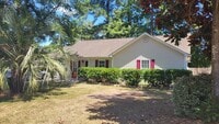 Building Photo - Welcome to this charming 3 bedroom, 2 bath...