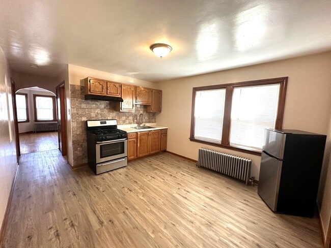 Building Photo - 7050 S Maplewood Ave