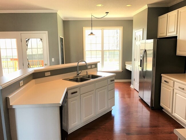 Building Photo - Great Family Home -  Fenced Backyard - Garage!