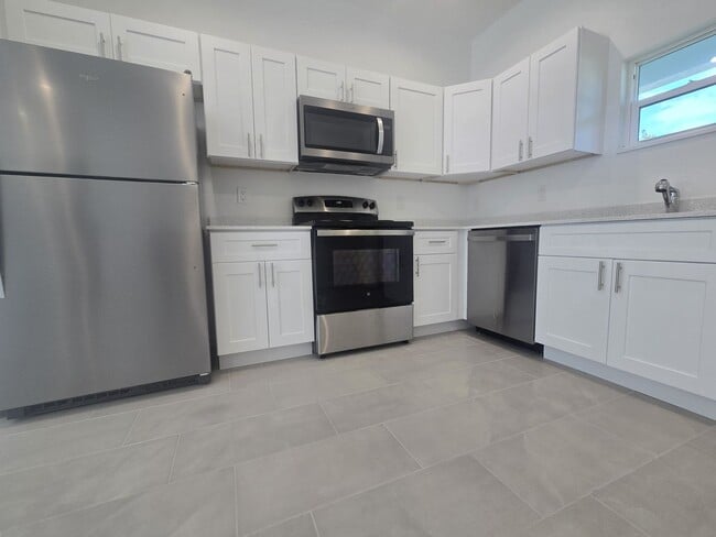 Building Photo - BRAND NEW-- TWO BEDROOM + TWO BATHROOMS- SOUTH LEHIGH ACRES