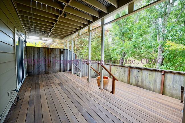 Building Photo - Modern Ground Floor Condo with 2 Car Garage!