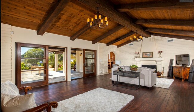 Building Photo - This Beautiful Hacienda Style Home combine...