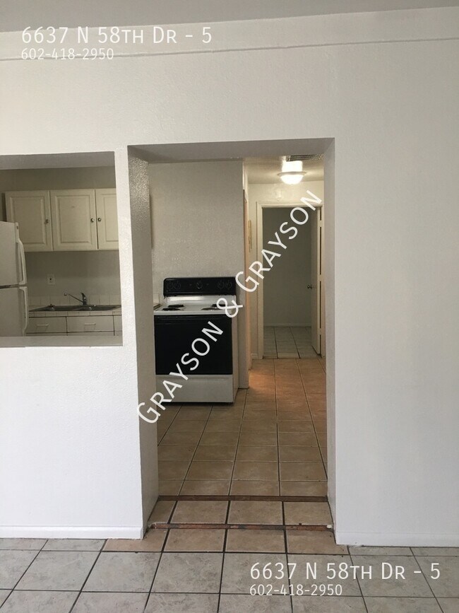 Building Photo - 6637 N 58th Dr