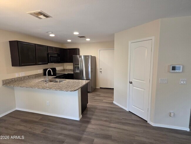 Building Photo - 6063 E Sotol Dr
