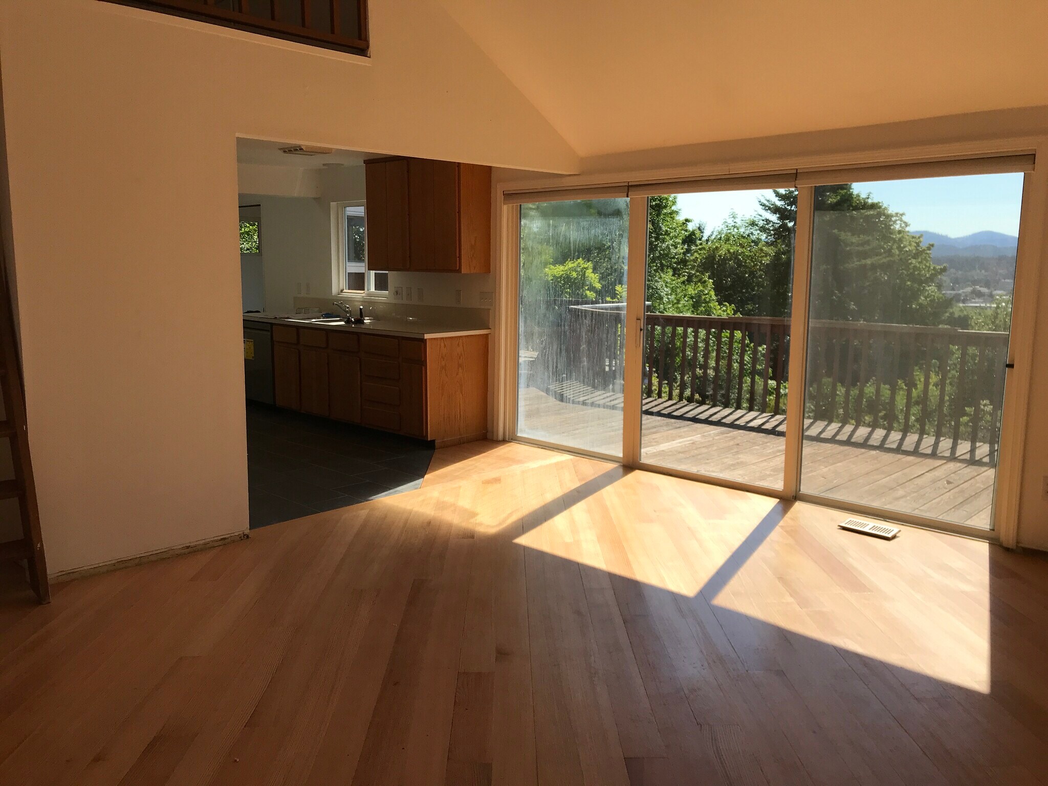 House: sunlight on red oak floor in dining room - 1609 7th Ave SE