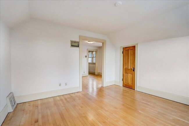 Hardwood floors throughout the unit - 322 E Rosedale Ave