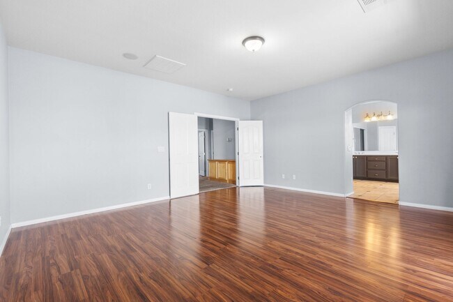 Building Photo - Beautiful 4BR Home in Gated Community with 3-Car Garage