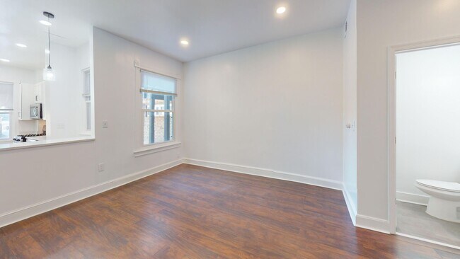 Building Photo - Four Bedroom 2,500 Square Foot House W/Back Patio, Multiple Kitchens/Laundry Facilities