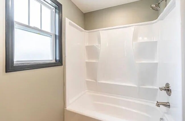 Building Photo - Fully Renovated 2BR/2BA with Garage – Walk to West Sixth & Legacy Trail