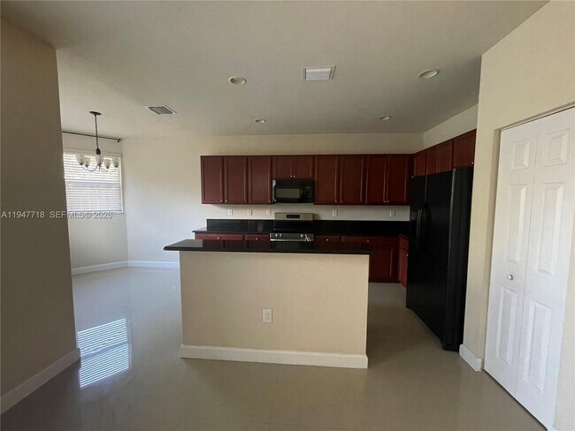 Building Photo - 10417 SW 231st Ter