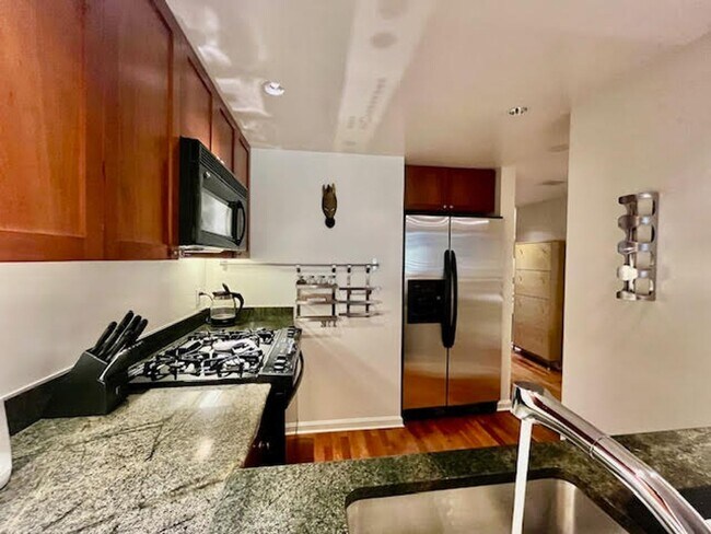 Building Photo - Perfect Blend of Elegance & Comfort at the...