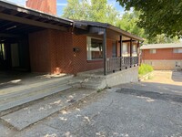 Building Photo - Beautiful town home with deep 2 car garage and a large covered patio