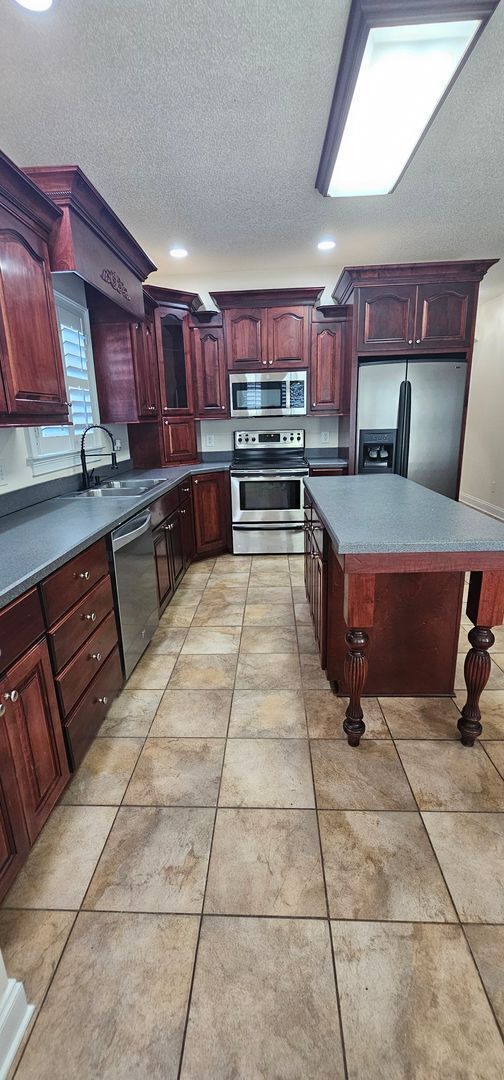 Building Photo - “Elegant 5-Bed Executive Home with Pool – ...