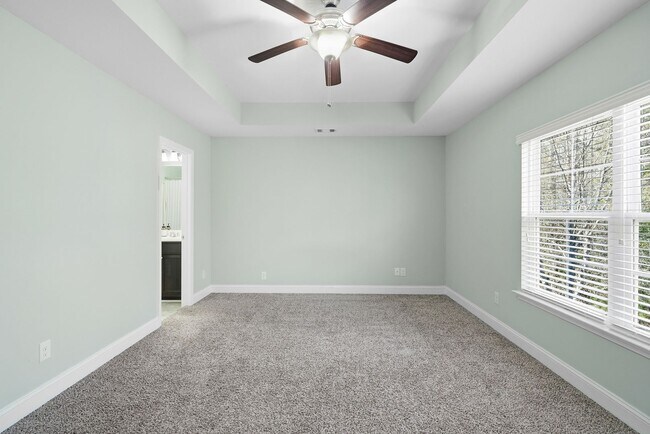 Building Photo - Charming 3 Bedroom Townhome with Private Patio & Fenced Backyard