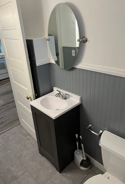 Half bath off kitchen - 5462 State Rd