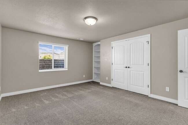 Building Photo - Spacious Syracuse Home with Covered Deck, Loft & Oversized 3-Car Garage