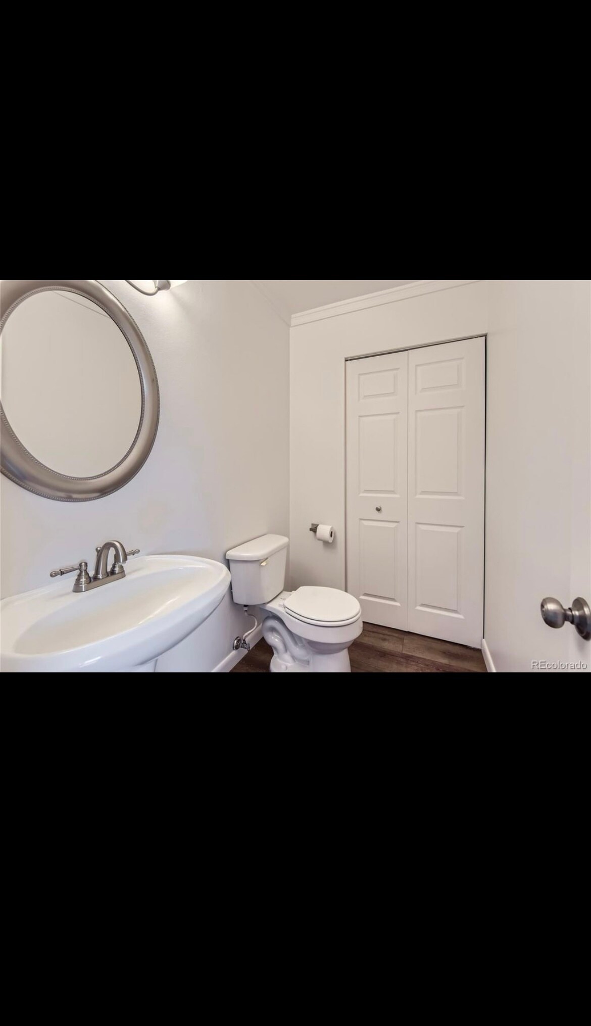 Half bathroom on main floor - 7137 S Webster St