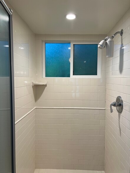 Tiled shower - 467 S Bentley Ave